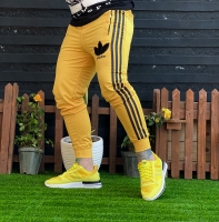 شلوار اسلش Adidas جدید زرد 3خط مشکی